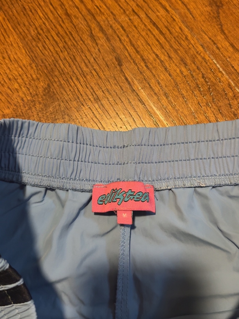 Edikted Light Blue Women’s Athletic Shorts with Navy Side Stripes - Picture 3 of 3